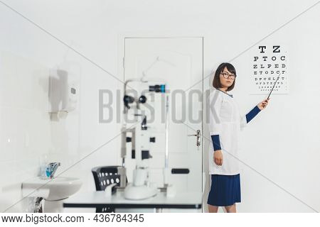 Ophthalmologist Intern In Office To Check Your Vision. Hospital, Clinic, Examination. Vision Tests A