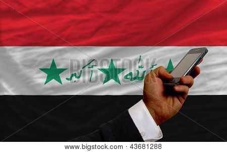 Cell Phone In Front  National Flag Of Iraq