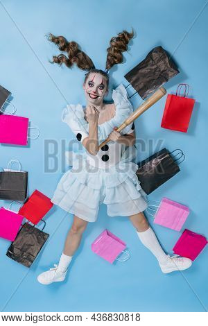Top View Of Young Girl With Bright Make-up For Celebrating Halloween Or Day Of The Dead. Costume Of 