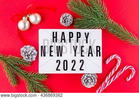 Festive Composition With Pine Branches, Candy Cane, Festive Balls And Light Box