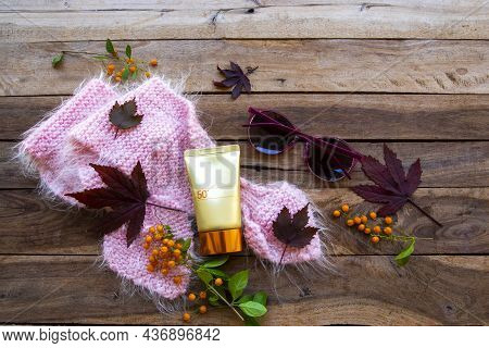 Sunscreen Spf50 Cosmetics Health Care For Skin Face With Sunglasses, Knitting Scarf And Meple Leaf O