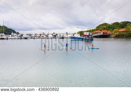 Panama City, September 7, Amador Marina And Resort, Three Paddle Surfers Move In The Bay. Shoot On S