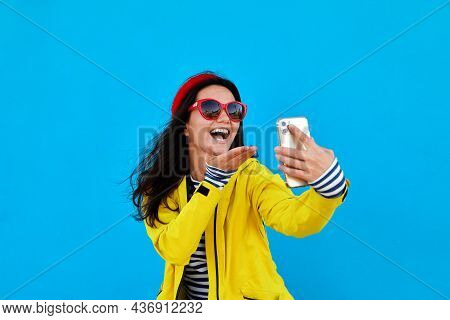 Woman Takes Picture Self Portrait Knitted Hat Smartphone Blue Background