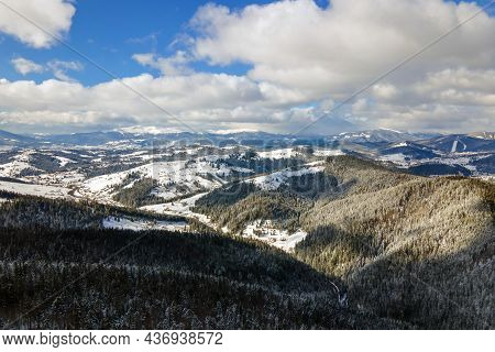 Winter Landscape With Spruse Trees Of Snow Covered Forest In Cold Mountains.