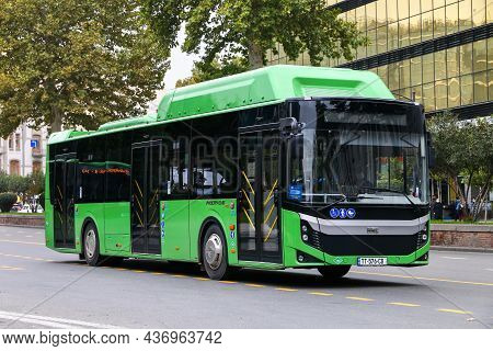 Tbilisi, Georgia - October 10, 2021: Green Urban Bus Bmc Procity 12lf Cng In A City Street.