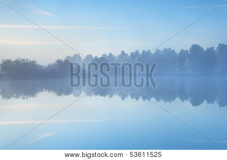 Tranquil Misty Morning On Lake