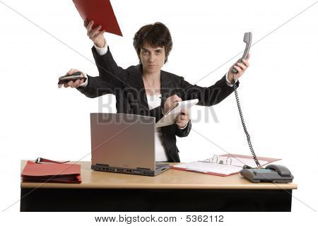 Mujer de negocios, haciendo múltiples tareas