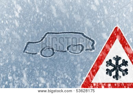 Winter driving - sketched car on a windshield