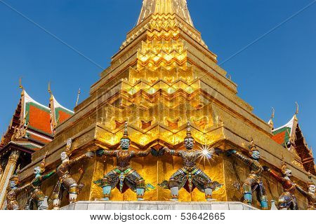 Giant Statue Hold Base Of Pagoda