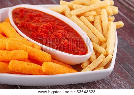 Potato, Corn Chips And Red Sauce