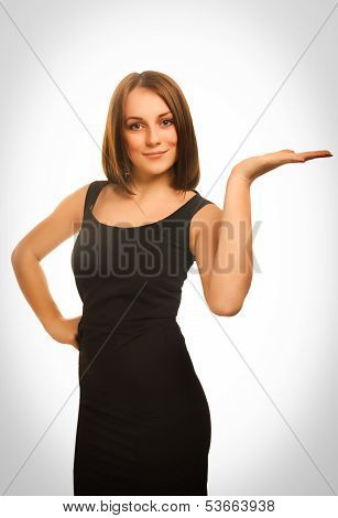 portrait happy young blond woman showing open hand holding