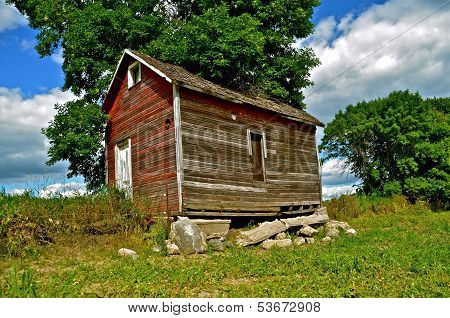 old granary on crumbling foundation