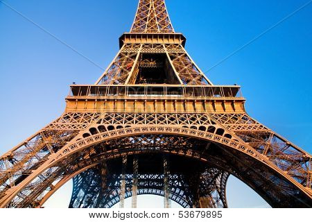 Eiffel Tower at wide angle. Middle section Blue sunny sky. Paris, France
