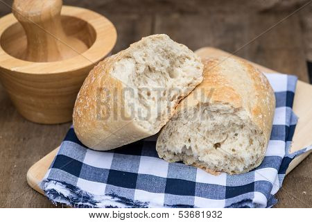 Loaf Of Sourdough Bread In Rustic Kitchend Setting