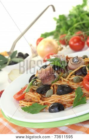 Spaghetti Alla Puttanesca With Olives And Anchovies