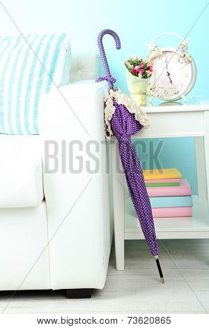 Umbrella in home interior close-up