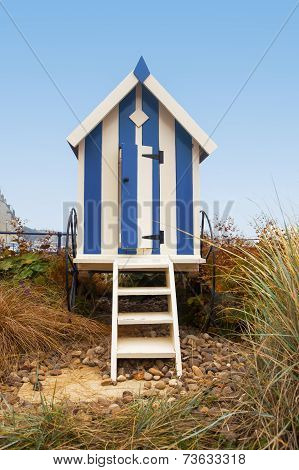 Portrait Format Blue Striped Beach Hut With Steps, Filey, Uk