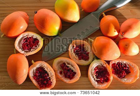 Passionfruit on  a Cutting Board with Knife