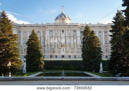 The Madrid Royal Palace and Sabatini garden at the calming sunset.