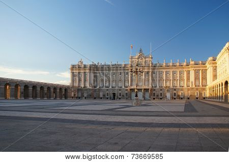 The square of the Madrid Royal Palace at the calming sunset.
