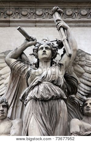 PARIS,FRANCE - NOV 08,2012:Architectur al details of Opera National de Paris: Lyrical Drama Facade sculpture by Perraud.Grand Opera is famous neo-baroque building in Paris.UNESCO World Heritage Site. 