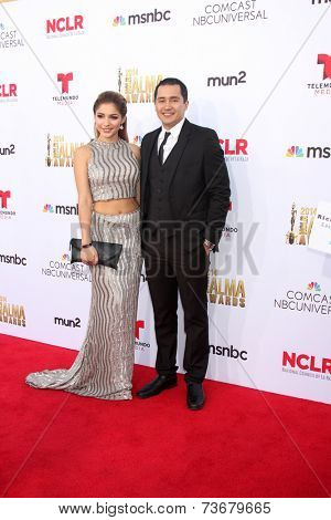 LOS ANGELES - OCT 10:  Josephine Ochoa, Rick Mancia at the ALMA Awards Arrivals 2014 at Civic Auditorium on October 10, 2014 in Pasadena, CA