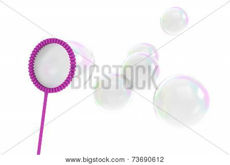 Reflective bubbles being blown from a wand toy