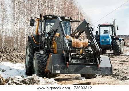 Plow tractors on agricultural machinery exhibition
