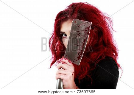 redhead woman with a bloody hatchet in hand