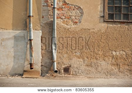 Two Drainpipe On House