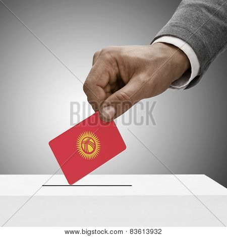 Black Male Holding Flag. Voting Concept - Kyrgyzstan