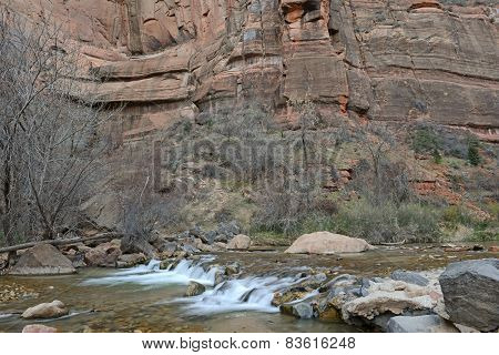 River and rapids in red rock landscape in Zion National Park, Utah