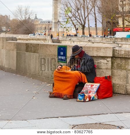 Clochard, homeless with dog in Paris