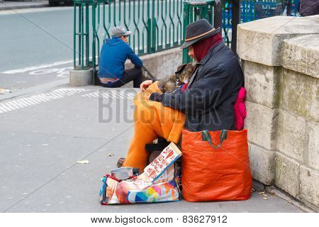 Clochard, homeless with dog in Paris