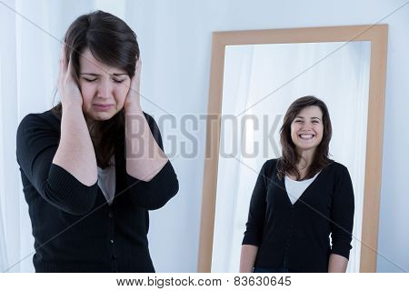 Woman And Her Reflection