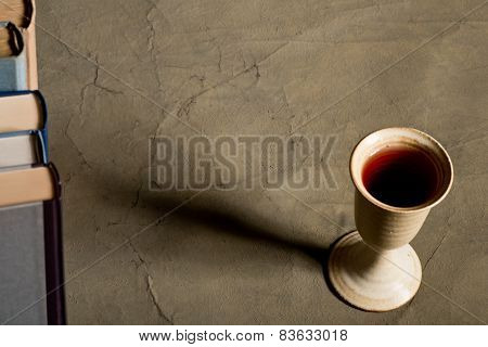 Chalice Of Wine With Books