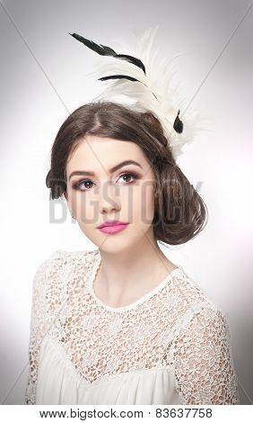 Hairstyle and make up - beautiful young girl art portrait. Genuine natural brunette with hair style