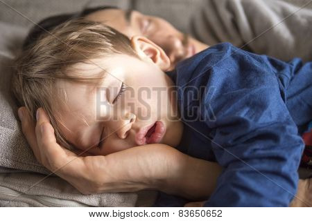 father and son napping
