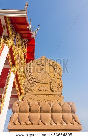 Wheel of Dhamma with temple