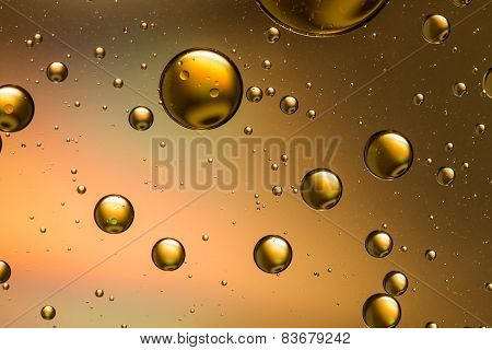 Gold oil and water abstract