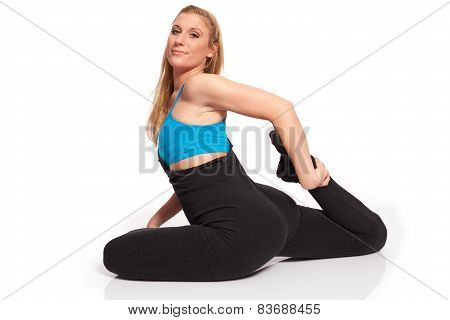 Young Sporty Woman In The Warm-up Workout