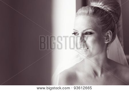 Black And White Portrait Of A Bride Near Window