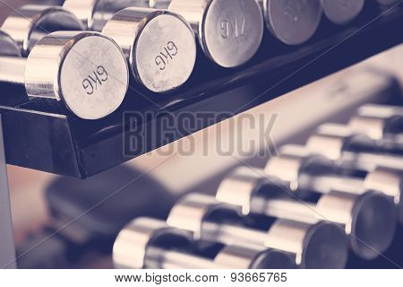 Sports dumbbells  ( Filtered image processed vintage effect. )
