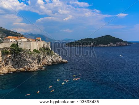 Blue Adriatic Waters Off Croatian Coast With Kayakers