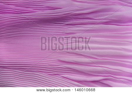 Pleated Fabric Background Texture. Pattern Of Fabric In The Crease Pattern For Backgrounds And Textu