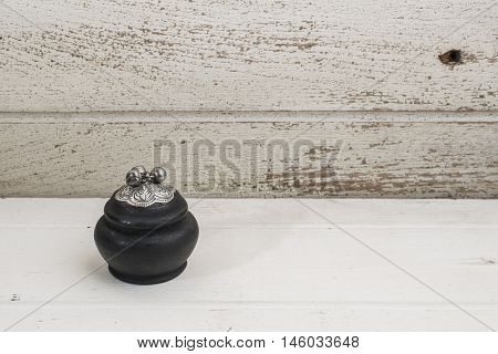 mini wooden handmade caskets on old wood background, souvenir of Chiengmai, Thailand