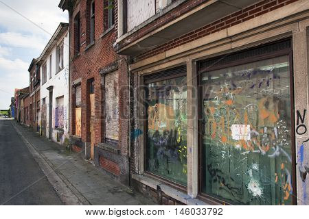 Street in ghost town Doel in Belgium