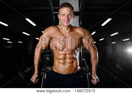 Strong Athletic Man Fitness Model Showing Six Pack Abs