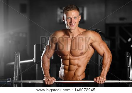 Strong Athletic Man Fitness Model Showing Six Pack Abs