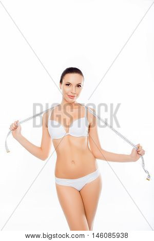 Attractive Healthy Slim Woman In Lingerie Holding Measuring Tape